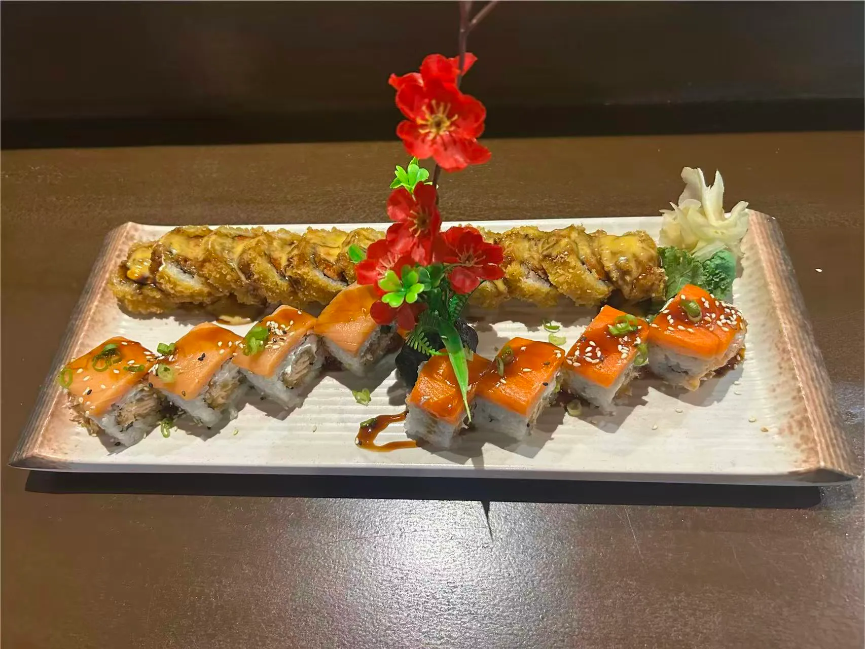 Mixed sushi roll platter with salmon rolls and fried tempura sushi at Sakura Sushi Restaurant, a Japanese Restaurant in Live Oak